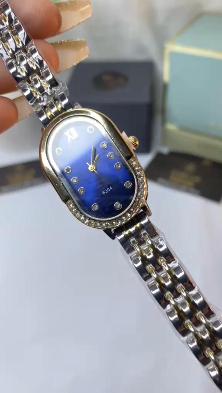 Oval black dial watch