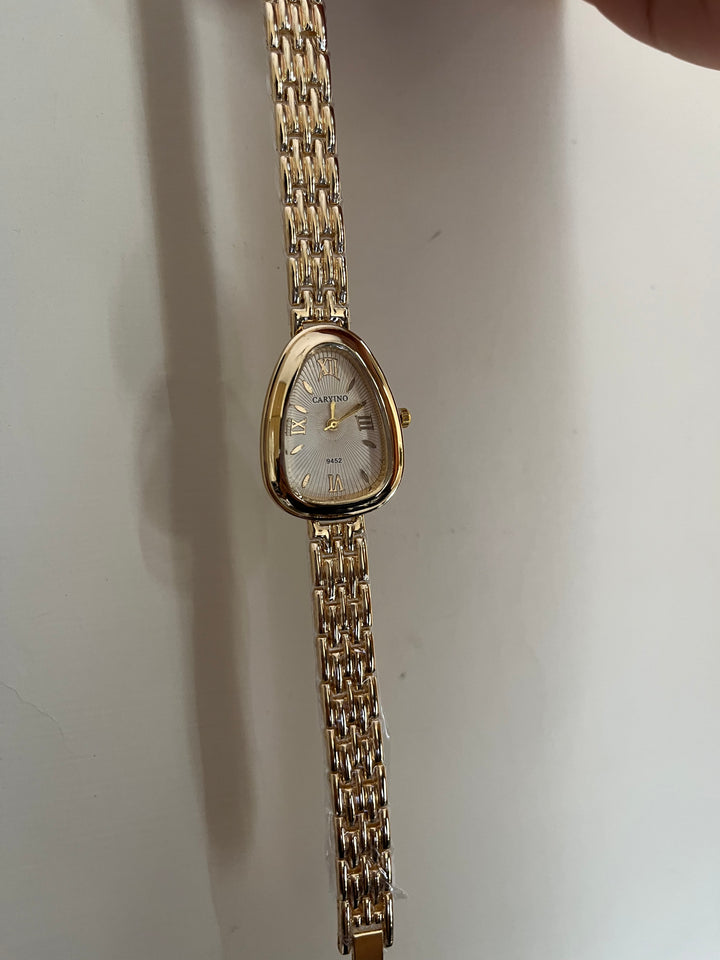 Snake shaped dial Watch
